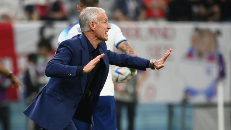 Deschamps passes on instructions from the touchline during Saturday's quarter-final against England