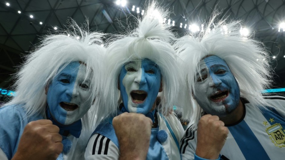 Argentina supporters cheer before the start of the Qatar 2022 World Cup football semi-final match between Argentina and Croatia 