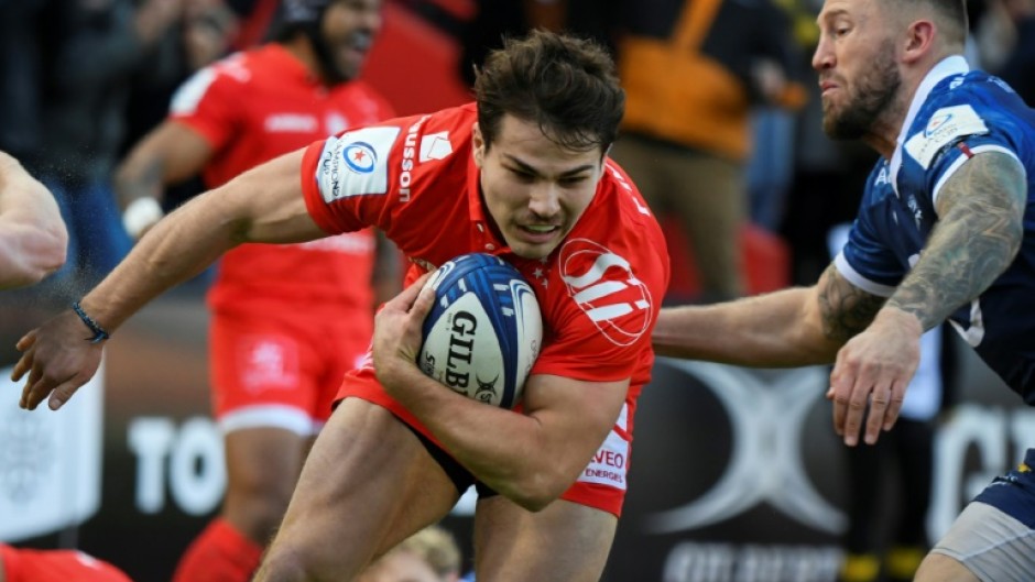 Antoine Dupont (C) scored two tries for Toulouse as they beat Sale 45-19 on Sunday