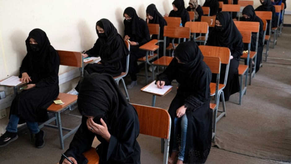 Afghan female students take entrance exams at Kabul University in Kabul in October 2022