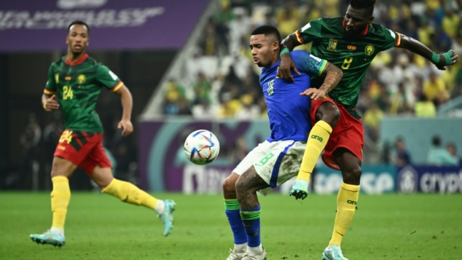 Injured - Arsenal and Brazil forward Gabriel Jesus (C) in action against Cameroon at the World Cup