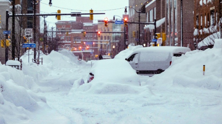Buffalo has been overwhelmed by a relentless blizzard that has caused at least 27 deaths in the region and trapped many more in their cars and homes