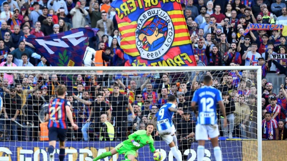 Espanyol's Spanish striker Joselu nets in the derby clash with Barcelona