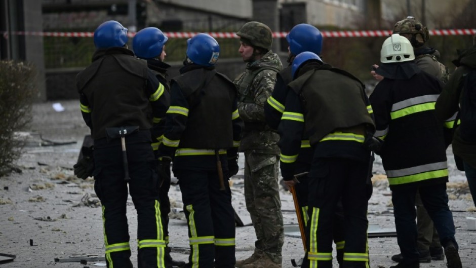 Rescue workers cordoned off nearby streets after the strikes