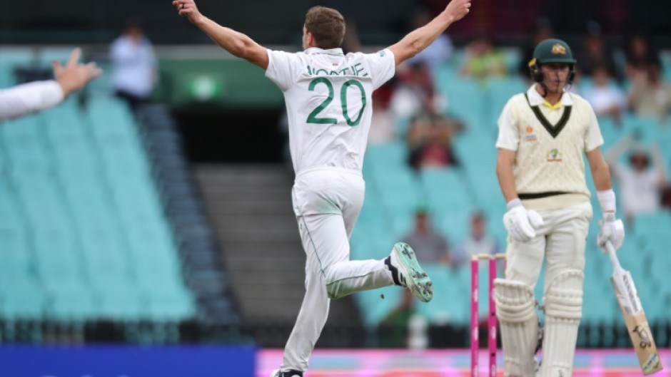 South Africa strike bowler Anrich Nortje claimed the key wickets of David Warner and Marnus Labuschagne to prise Australia's grip on the third Test in Sydney