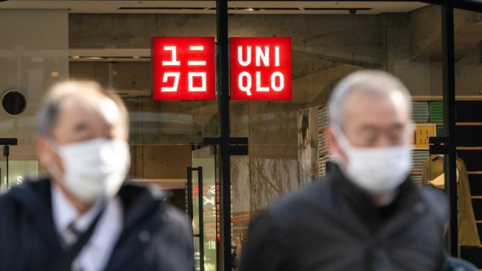 Uniqlo parent company Fast Retailing will raise wages for some employees in Japan by up to 40 percent