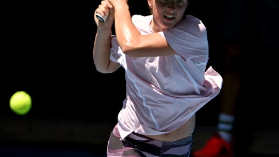 Poland's Iga Swiatek hits a return ahead of the Australian Open 