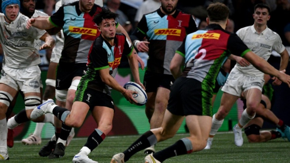 On the break: Harlequins fly-half Marcus Smith launches a break in Sunday's  game against Racing 92