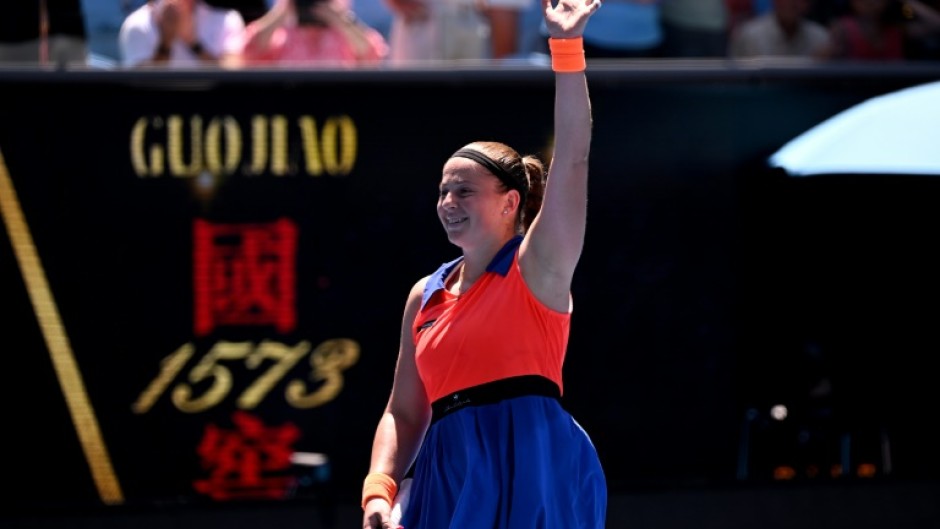 Jelena Ostapenko celebrates victory against Coco Gauff