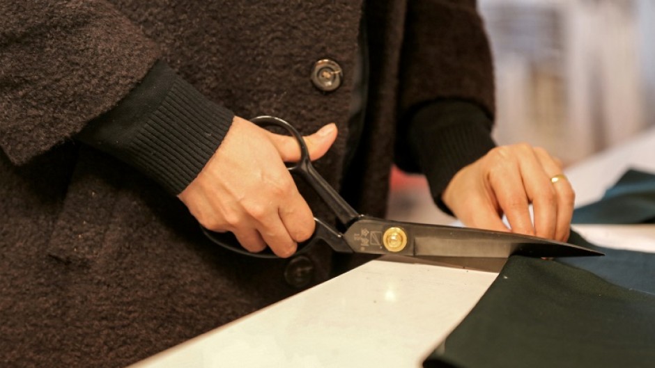 Cutting cloth: Alaa Adel, a graduate of the University of Baghdad who specialised in fashion and design, wanted to create her own fashion house