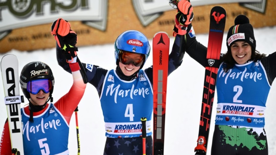 Mikaela Shiffrin (C) won a record-breaking 83rd World Cup race on Tuesday
