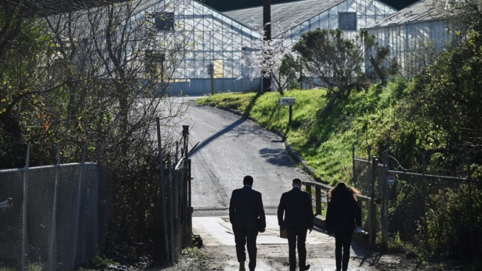 FBI agents investigate the crime scene after a shooting in Half Moon Bay, California, January 24, 2023