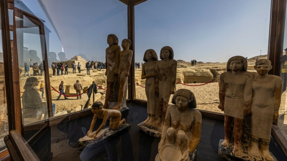 One of the tombs in Saqqara included a collection of 'the largest statues' ever found in the area, a top official said