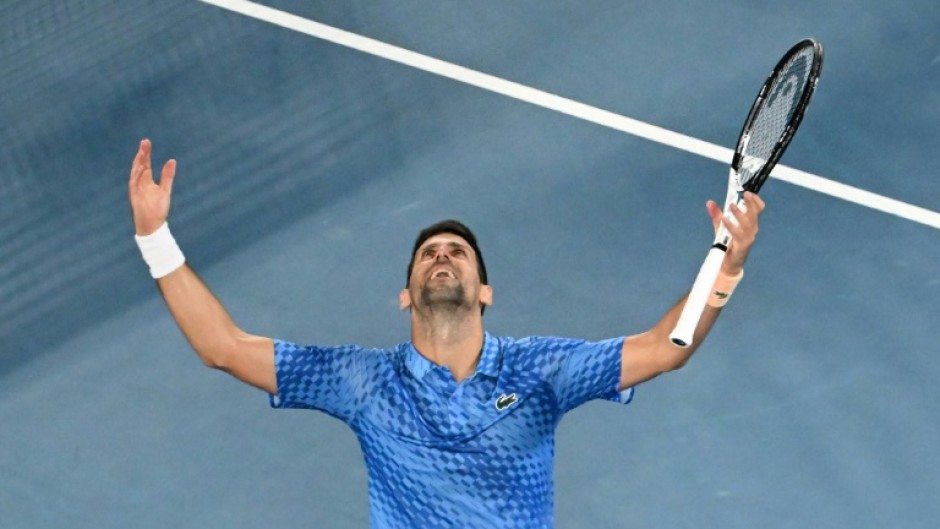 Serbia's Novak Djokovic celebrates his victory against Greece's Stefanos Tsitsipas