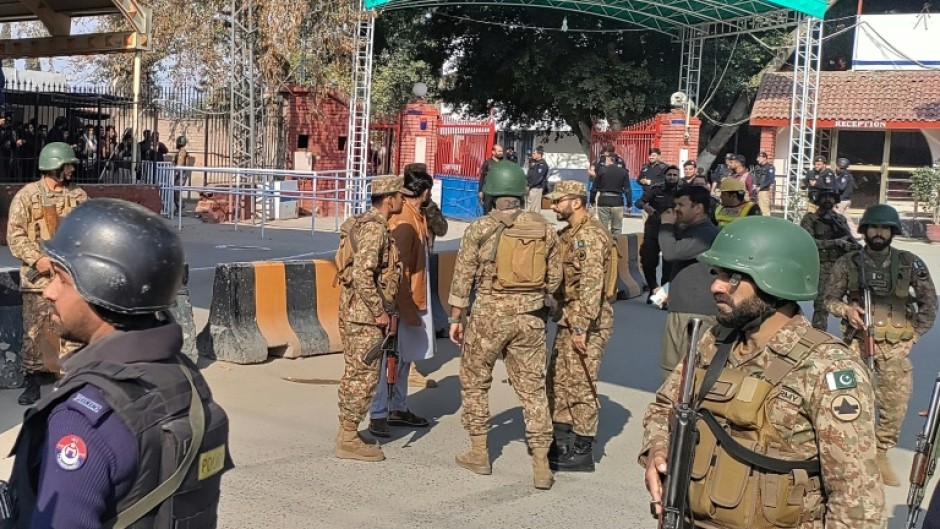 A blast at a mosque inside a police headquarters in Pakistan killed at least 25 worshippers