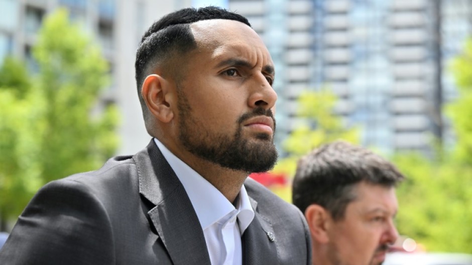 Nick Kyrgios arrives on crutches to the magistrate's court in Canberra