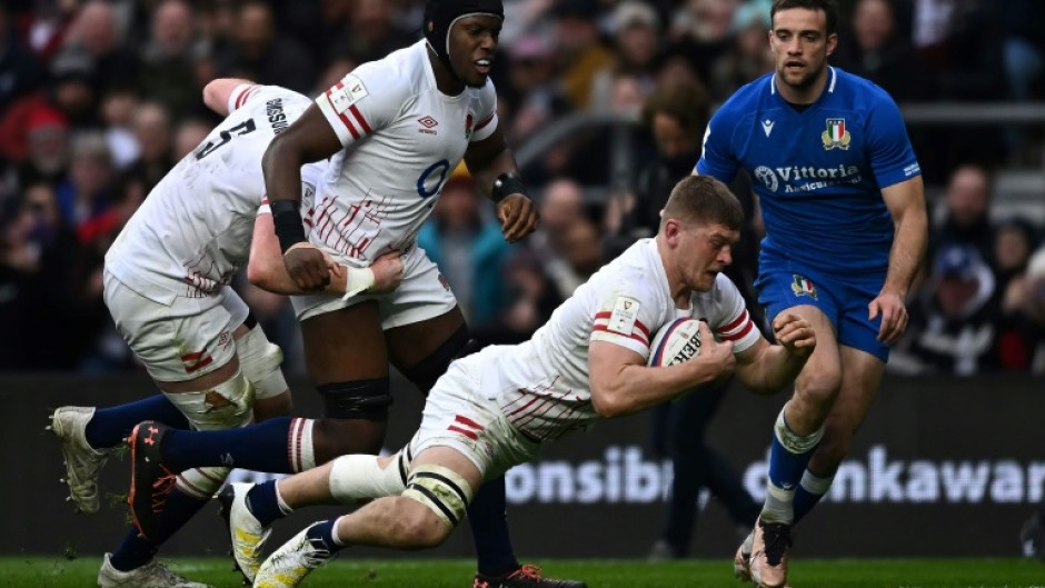 Opening score - England flanker Jack Willis dives to score the hosts' first try against Italy at Twickenham