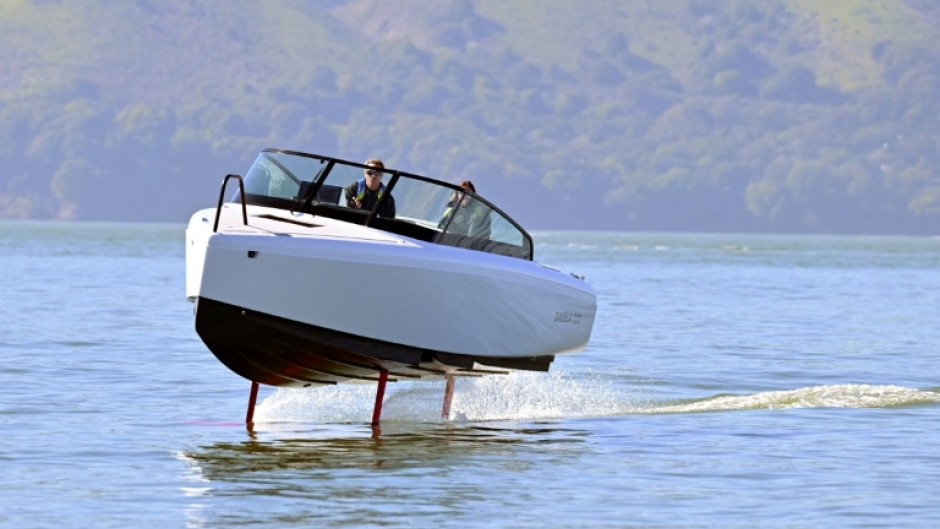 French sailor Tanguy de Lamotte, CEO of Candela US, drives the company's "flying" electric C-8 boat in Sausalito, California on February 8, 2023