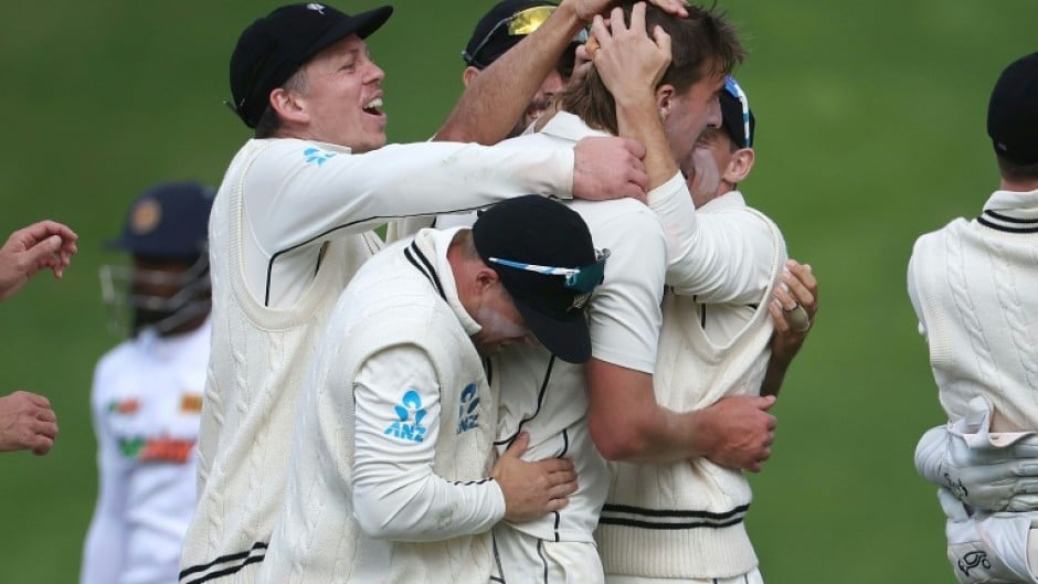 New Zealand players celebrate the wicket of Sri Lanka's Nishan Madushka on their way to winning the second Test on Monday in Wellington