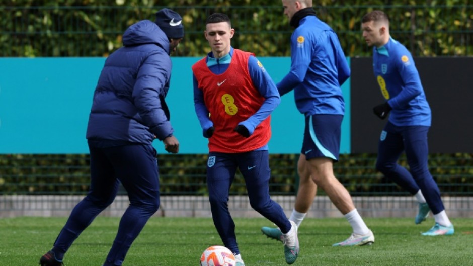 England midfielder Phil Foden (2L) had his appendix removed on Sunday 