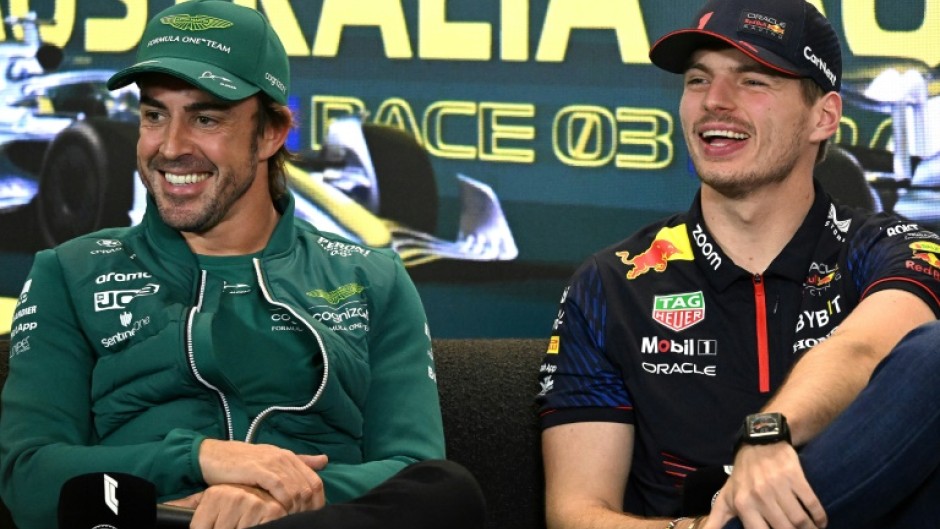 Red Bull's Max Verstappen (R) and Aston Martin's Spanish driver Fernando Alonso in Melbourne