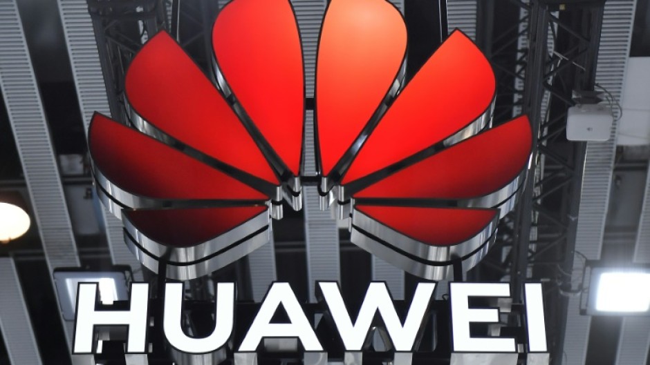 A picture taken on February 28, 2023 shows Chinese manufacturer Huawei logo at the Mobile World Congress (MWC), the telecom industry's biggest annual gathering, in Barcelona. 