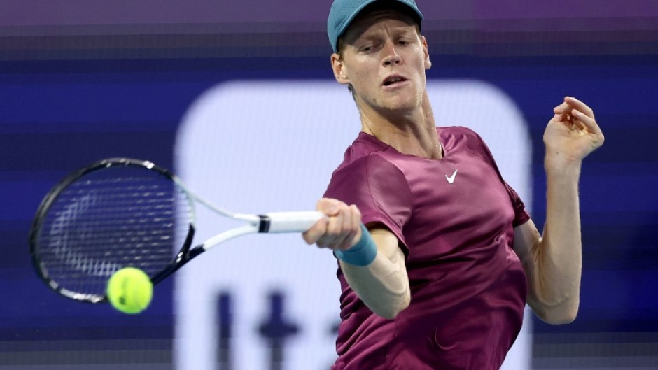 Italy's Jannik Sinner is through to the final of the Miami Open after beating defending champion Carlos Alcaraz of Spain