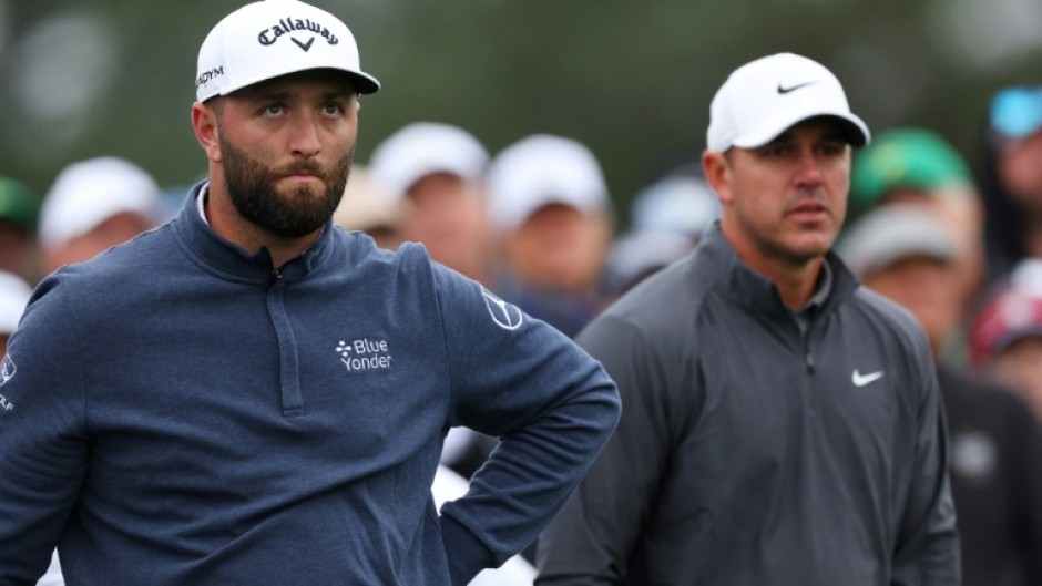 Spain's third-ranked Jon Rahm, left, and four-time major winner Brooks Koepka of the United States looked set for a final-round Masters duel