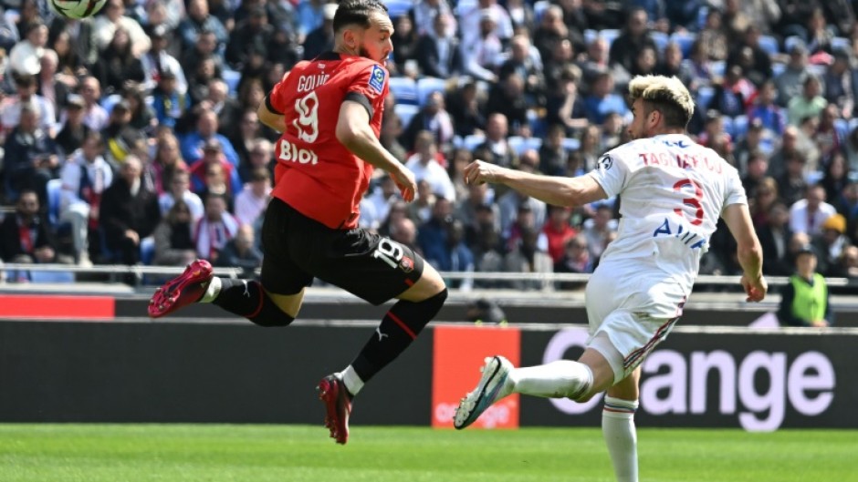 Amine Gouiri (L) scored the opener for Rennes but hosts Lyon hit back with three goals