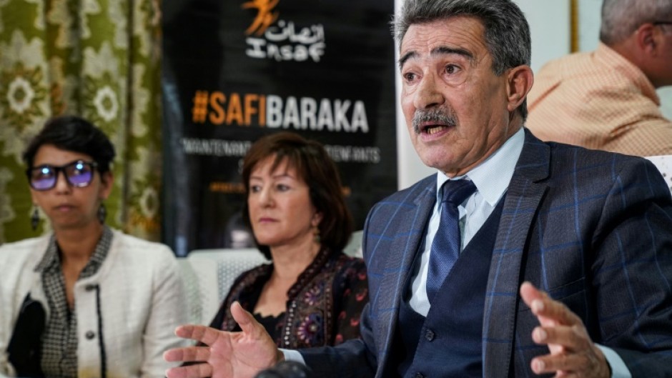 Moroccan lawyer Mohamed Sebbar (R), made his appeal for changes to the law on the eve of an appeal hearing by the child rape victim