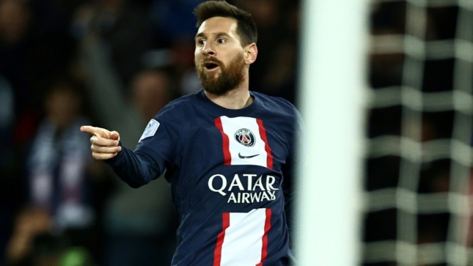 Lionel Messi celebrates after scoring in Paris Saint-Germain's win over title rivals Lens on Saturday
