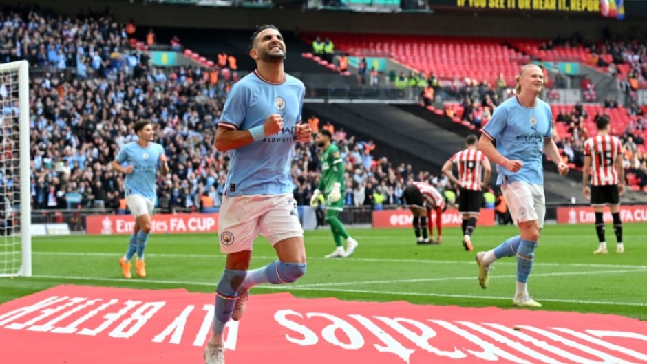 Manchester City's Riyad Mahrez celebrates scoring against Sheffield United