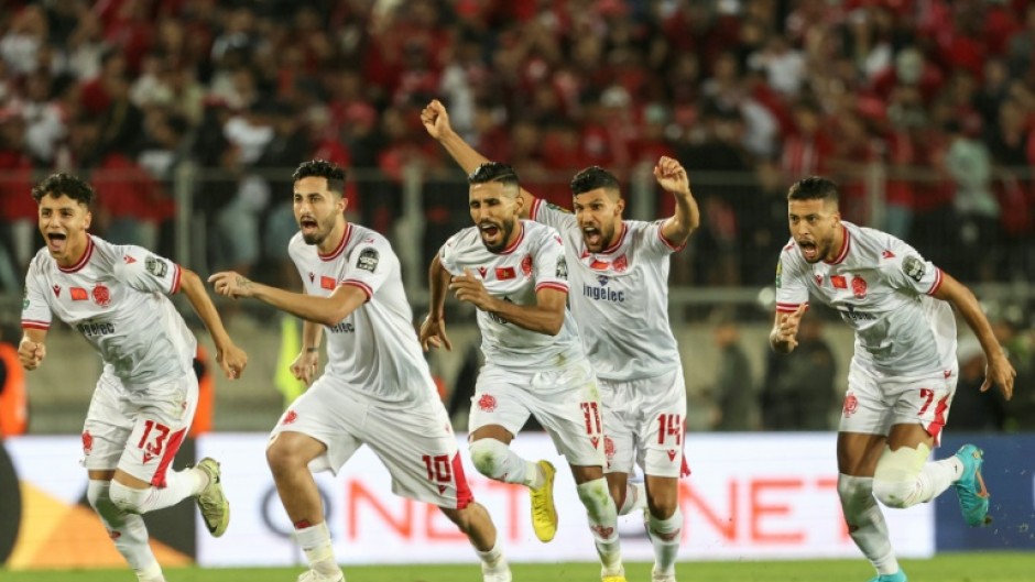 Wydad Casablanca players celebrate reaching the CAF Champions League semi-finals.