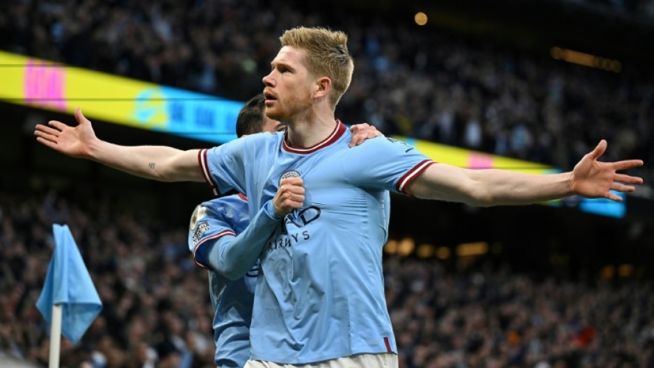 Demolition man: Manchester City's Kevin De Bruyne celebrates scoring against Arsenal