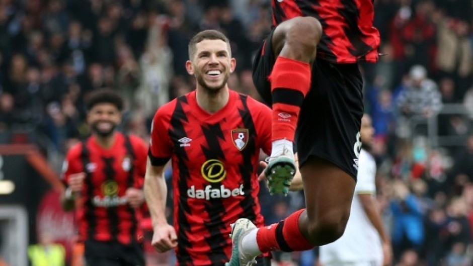 At the double - Bournemouth's midfielder Jefferson Lerma (R) celebrates after the first of his two goals in a 3-1 win over Leeds