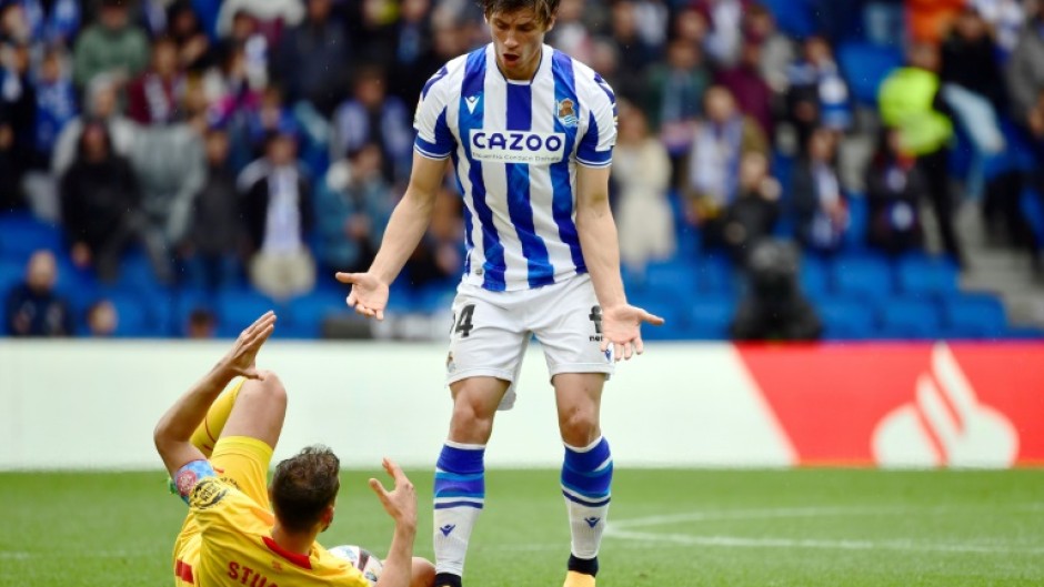 Real Sociedad's French defender Robin Le Normand (R) can now play for the Spanish national team