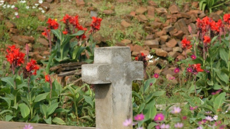 Slaughter: 2004 file picture of a mass grave and the ruins of the Notre Dame de la Visitation church in Nyange where around 2,000 Tutsis were killed