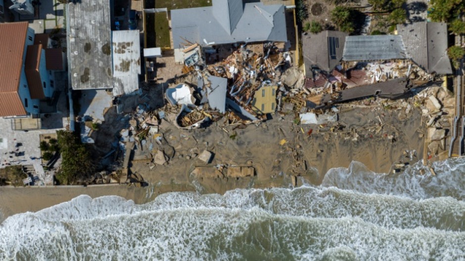 An aerial view of destroyed beachfront homes in the aftermath of Hurricane Nicole at Daytona Beach, Florida, on November 11, 2022