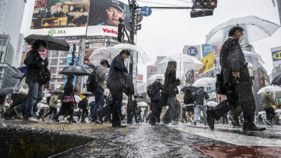 Scientists say climate change is intensifying the risk of heavy rain in Japan