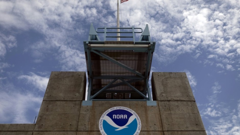 The logo of National Oceanic and Atmospheric Administration (NOAA) is seen at the Nation Hurricane Center on August in Miami