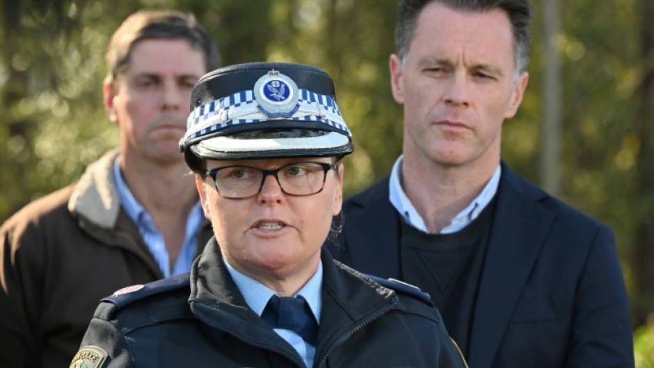 The driver was arrested but no charges have been laid so far, said Acting Assistant Commissioner Tracy Chapman (C, with NSW Premier Chris Minns, R) 