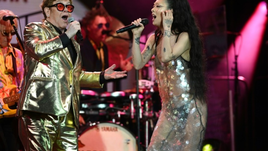 John shared the stage with Rina Sawayama for the duet 'Don't Go Breaking My Heart'