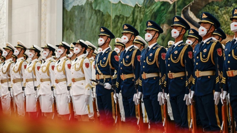 Chinese honor guards take formation at the Great Hall of the People in Beijing on June 28, 2023 