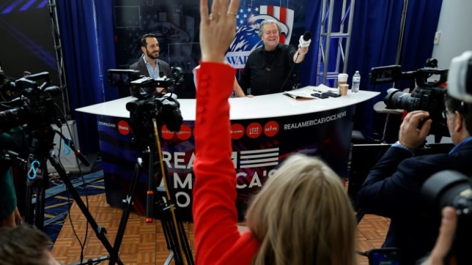 Steve Bannon (R), former advisor to former US president Donald Trump, hosts his War Room podcast live during the Conservative Political Action Conference on March 2, 2023 in National Harbor, Maryland