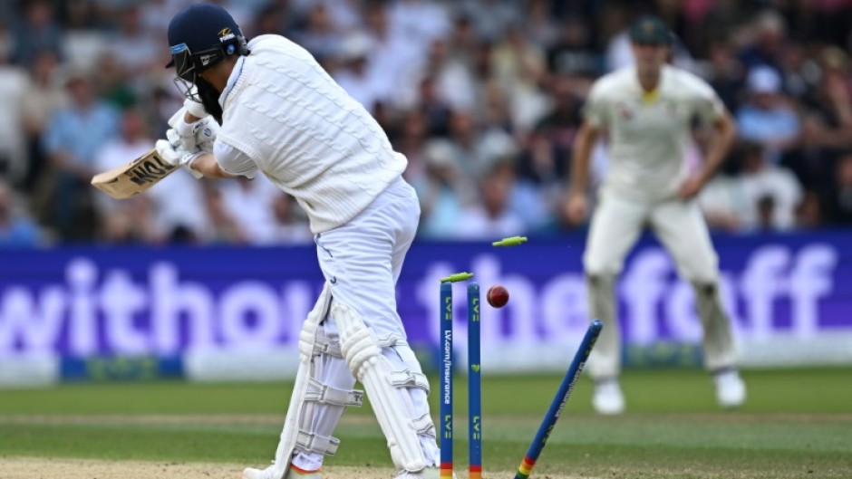England's Moeen Ali is bowled for five by Australia's Mitchell Starc