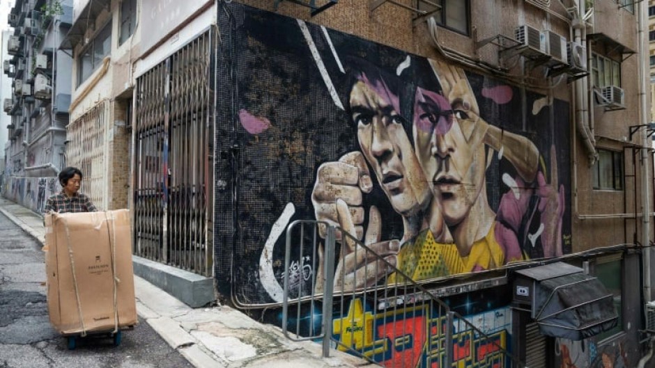 A Hong Kong mural pays tribute to Bruce Lee, whose films spawned a kung fu craze around the world