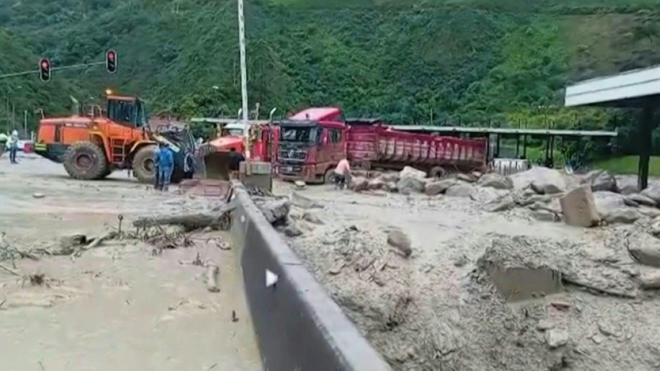 Aftermath of a landslide triggered by heavy rains that left multiple people dead