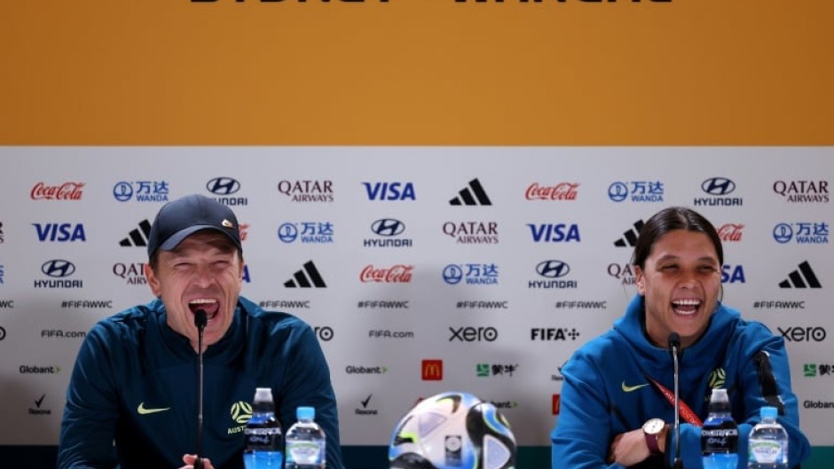 Australian coach Tony Gustavsson (L) and captain Sam Kerr were all smiles at their pre-match press conference