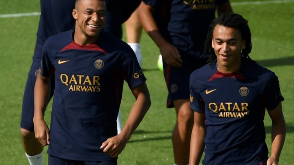 Kylian Mbappe (left) and his younger brother Ethan  at PSG training ahead of the club's Japan tour, which the older brother will now not be joining