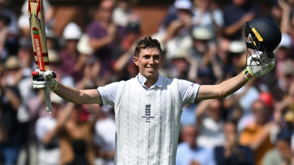 Ton of joy: England's Zak Crawley celebrates his hundred in the fourth Ashes Test at Old Trafford